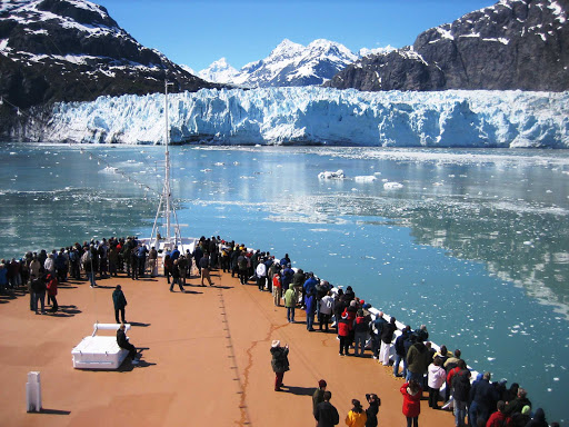 Glacier-Bay-cruise-view - Passengers on a cruise ship in Glacier Bay National Park, Alaska.