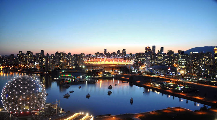The skyline of Vancouver, British Columbia, at dusk 