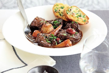 Braised beef with anchovy toasts