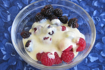 Fresh raspberries with white chocolate-lemon ganache