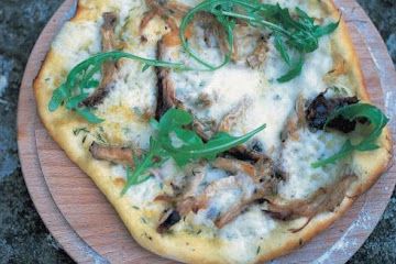 Slow-roasted shredded pork with thyme, Taleggio and lemon-dressed rocket pizza dressing