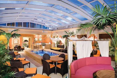 Take a dip in the private pool or relax on one of the lounge chairs of Norwegian Pearl's Courtyard, accessible only to guests of the Haven accommodations.