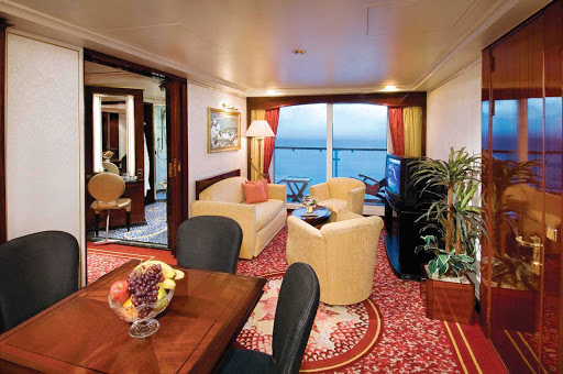 Norwegian-Spirit-stateroom-Penthouse-large-balcony - Comfortable bedroom furnishings and separate dining and living areas overlooking the  private balcony await you when you book a Penthouse with large balcony aboard Norwegian Spirit. 