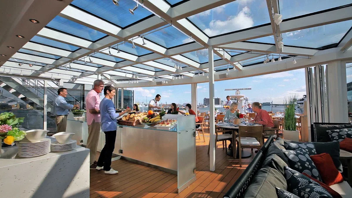 Viking-River-Cruises-Longships-Aquavit-Terrace-inside - Enjoy casual dining in Aquavit Terrace while taking in the majestic scenery of Europe as you sail aboard your Viking Longship. 