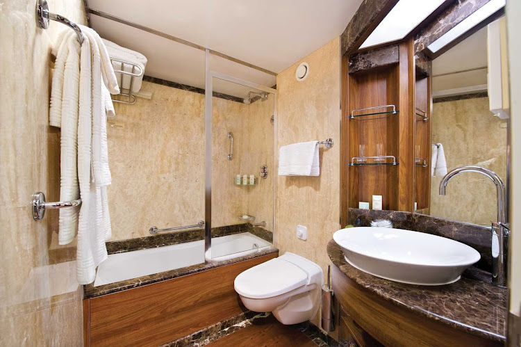 The marble bathroom and full-size bath in Silver Wind's Veranda Suite. Marble bathrooms are the standard aboard all Silversea ships.