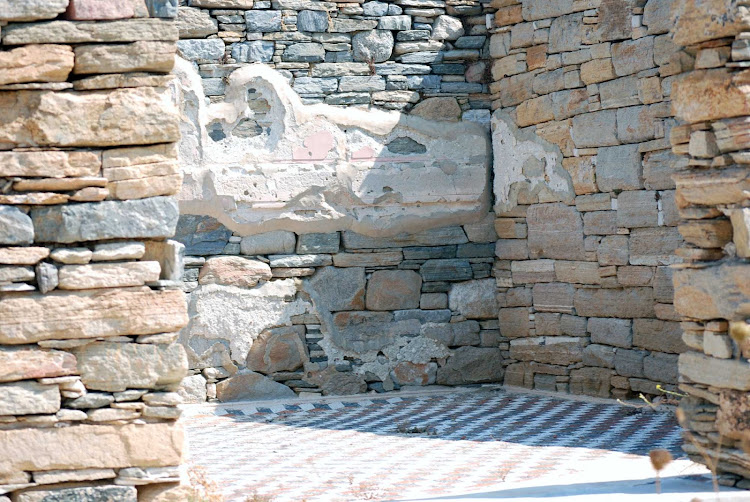 A wall of a residence on Delos, Greece. The abandoned island is one of the major mythological, historical and archaeological sites in Greece.