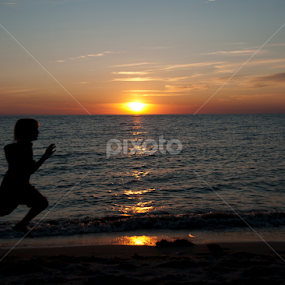 Beach Silhouette  by Dawn Robinson - Landscapes Beaches