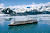 Holland America's Oosterdam sails by the Hubbard Glacier in Alaska.