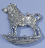 Zilveren plaquette met een keeshond. Nederland, ca. 1784-1787
