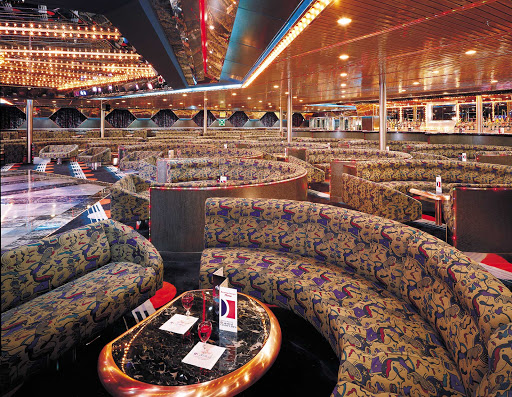 Carnival-Ecstasy-Starlight-Lounge - Enjoy an evening of comedy shows and karaoke with a live backup band in the Starlight Lounge when you sail on Carnival Ecstasy.