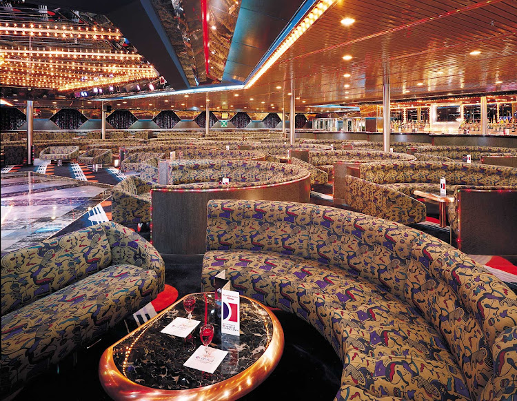 Enjoy an evening of comedy shows and karaoke with a live backup band in the Starlight Lounge when you sail on Carnival Ecstasy.