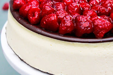 Raspberry Chocolate Ganache Cheesecake with Oreo Crust