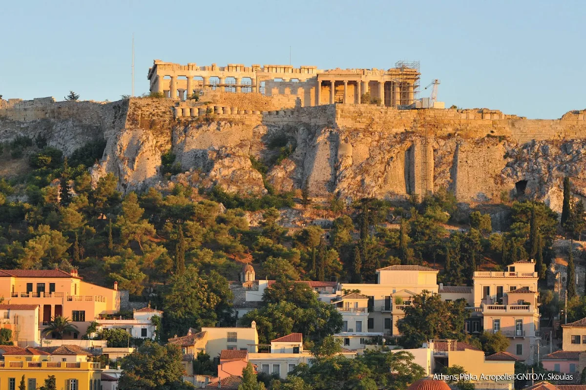 Plaka-Acropolis-Athens - The Plaka, the most desired area of Athens, shows off its neoclassical side at sunset on the north slope of the Acropolis.