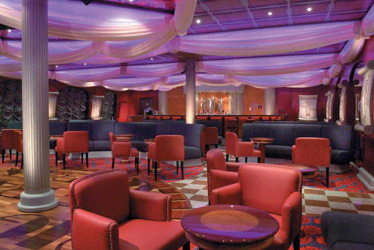 Meet new friends for cocktails at Carnival Freedom's Swingtime Jazz Club, a 1930s-themed dance and live music lounge.