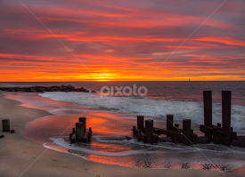 Breaking surf and sun by Deborah Felmey - Landscapes Beaches