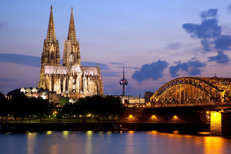 Cologne Cathedral and the Hohenzollern Bridge in Cologne, Germany.