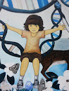 Boy on DNA Swing Mural