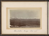 View of a plain and the snow-capped mountain range of Chomolhari in Bhutan