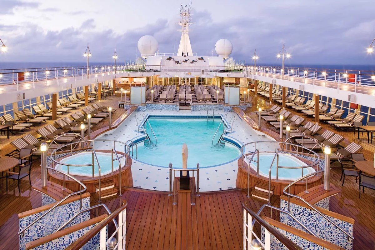 Regent-Seven-Seas-Voyager-Pool-Deck - Seven Seas Voyager's expansive pool deck is a great place to kick back, read and enjoy the beautiful weather and scenery.
