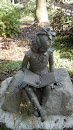 Reading Child Statue