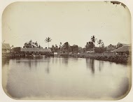 Huizen aan de Tondano te Manado