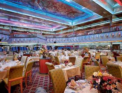 Sit down for a multi-course meal in the elegant Platinum restaurant, one of Carnival Glory's two main dining halls.