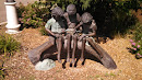 Kids with a Bug Sculpture