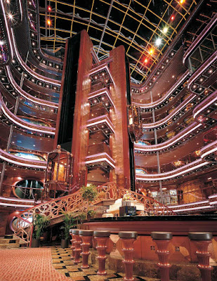 Share a cocktail as you take in Carnival Elation's eye-catching 6-story Grand Atrium.