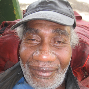 Homeless man in Pago Pago by Veronica Magnusson - People Portraits of Men