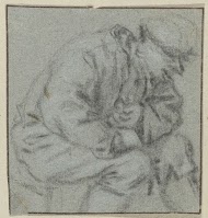 Borststuk van een man met pet, zijn armen over elkaar