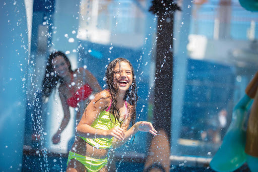 Kids having fun in the Aqua Park, available on Norwegian Breakaway and Getaway. The pool features such Nickelodeon characters as SpongeBob, Patrick, Squidward and Sandy.