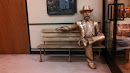 Total Wine Man on Bench Statue