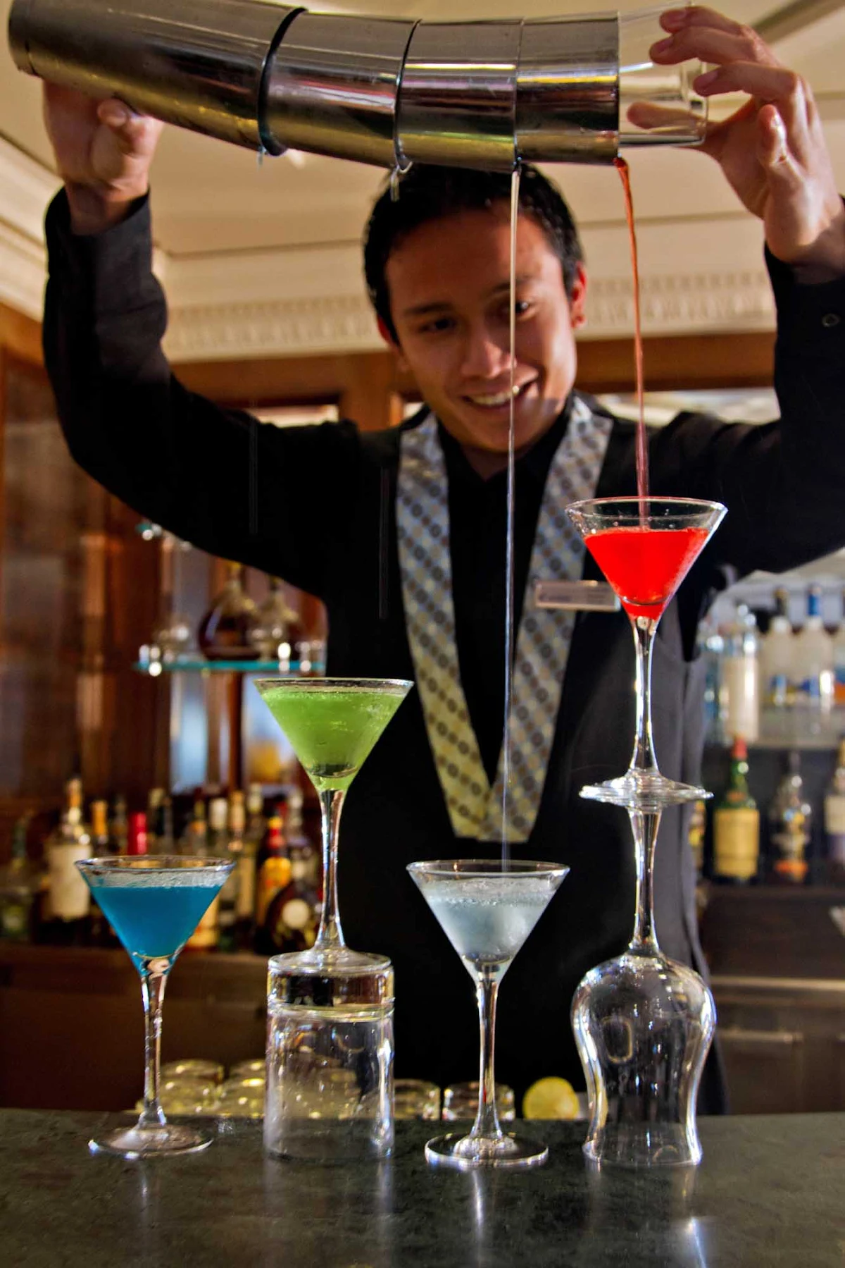 Azamara-Martini-Bar-bartender - Watch the bartender create one of 20 variations of martini in the sophisticated Martini Bar on your Azamara cruise.