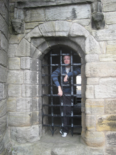 Sean putting on a great face at being behind bars in the castle.