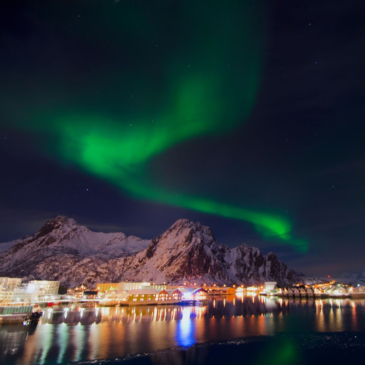 A dazzling display of the aurora borealis captured over Svolvaer near the coastline of Norway from the top deck of Hurtigruten's cruise ship Finnmarken. 