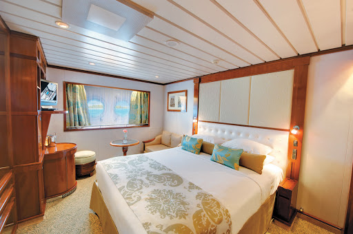 Stretch out, then take in the view: The Window Stateroom (Category F) on the Paul Gauguin.