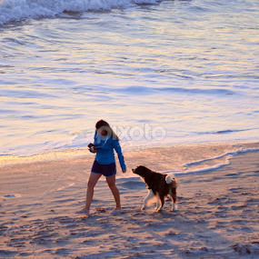 Woman and Her Bestie at Sunset by Jacob Uriel - Landscapes Beaches