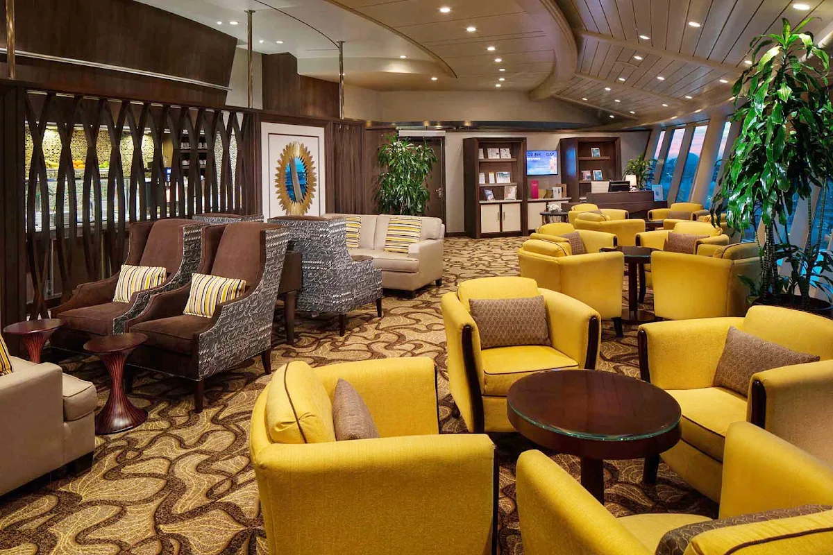 Navigator-of-the-Seas-Diamond-Lounge - Suite and Crown & Anchor Society members can kick back and relax in the Diamond Lounge aboard Navigator of the Seas.
