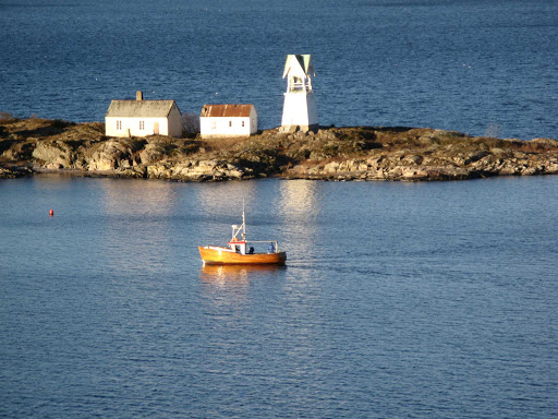 Boat and lighthouse in Oslo Fjord.