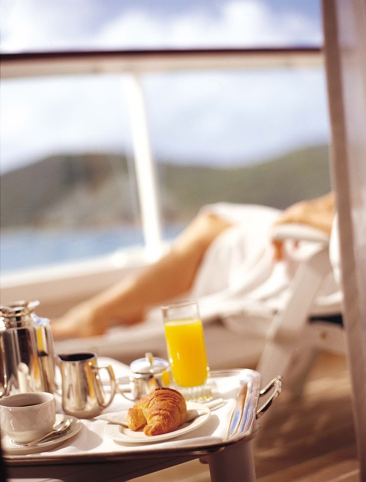 Your stateroom veranda is the perfect place to enjoy a relaxing private breakfast as the day begins aboard a Crystal cruise.