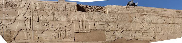 A panorama of a frieze depicting pharaohs and other ancient figures in the precinct of Amun in Karnak Temple at Luxor, Egypt. See it as part of a cultural experience aboard Uniworld's River Tosca or Princess Cruises' Pacific Princess.