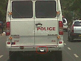 One of the Police Van in Chennai, look at the area marked in Red, just wondering how can the number go missing in the backside, but luckily the number was there in the front. by Saurav Banerjee -  