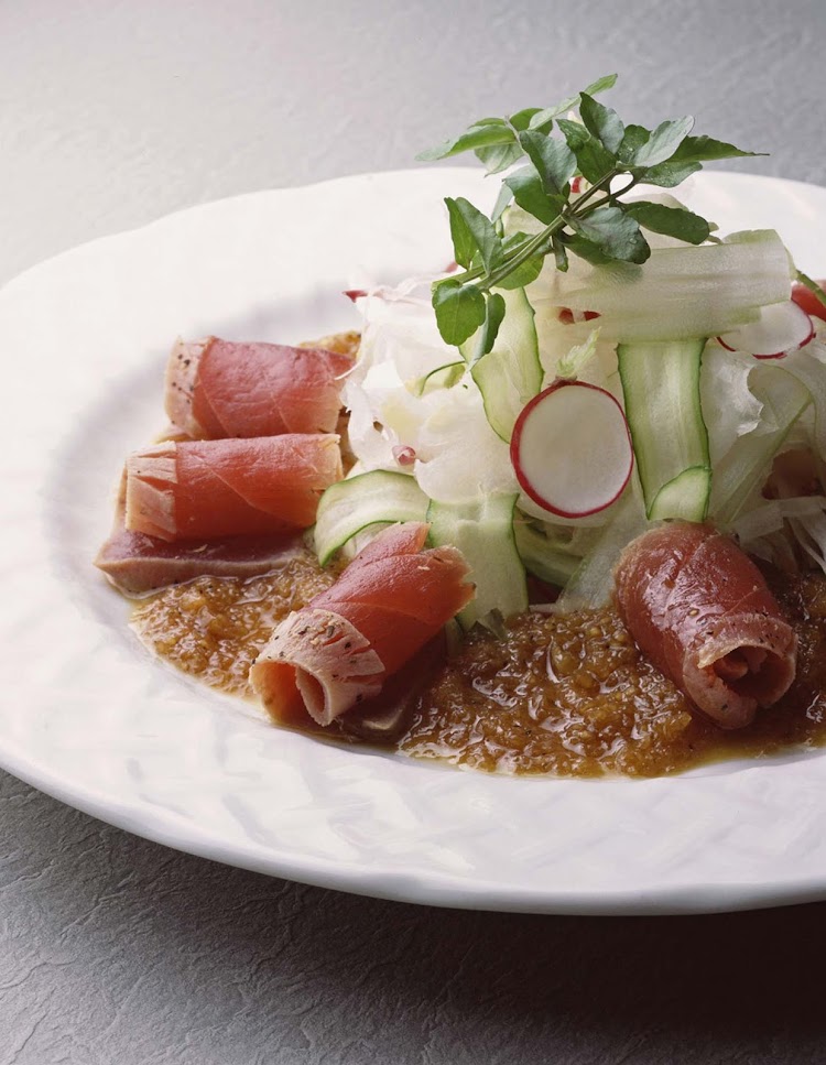 While dining on a Crystal cruise liner, try the Nobu Sashimi Salad for a delicious way to start your meal.