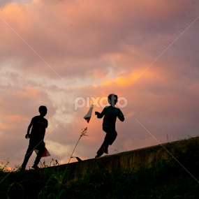 Playing kite by Taufique Rahman - Landscapes Sunsets & Sunrises