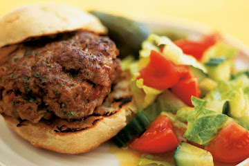 Elvis burger with chopped salad and pickled gherkin