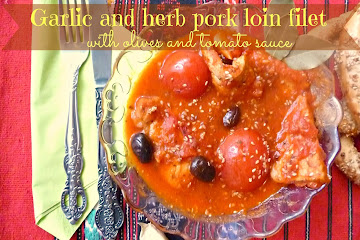 Garlic and herb pork loin filet with olives and tomato sauce