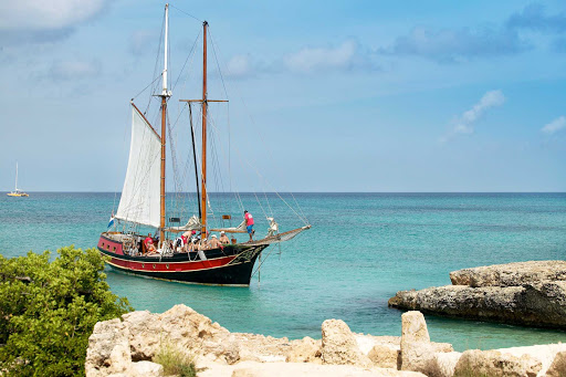 A shiver-me-timbers tourist boat in the crystal clear waters of Aruba.