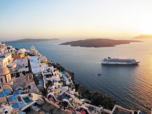 Norwegian Jade stops in the flooded crescent-shaped caldera that forms the interior of Santorini, Greece.