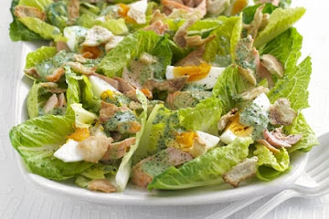 Grilled salmon salad with watercress yogurt dressing
