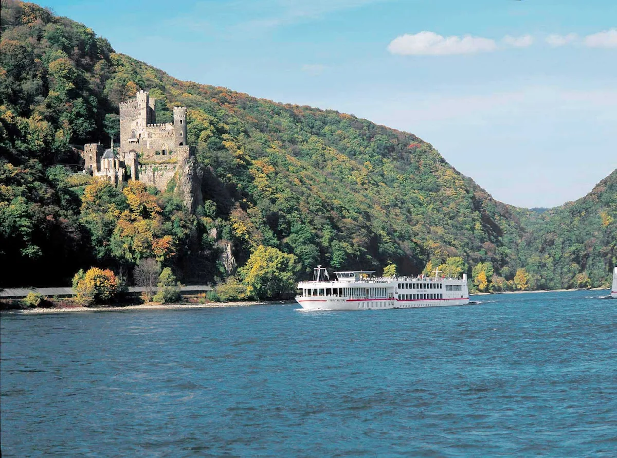 Viking-Neptune-Rheichenstein-Castle - Viking’s signature cruises pass through a storybook land of castles on the Rhine River. Passengers fill the decks to hear tales of romance and treachery during the live narration along the Middle Rhine, a UNESCO World Heritage Site.